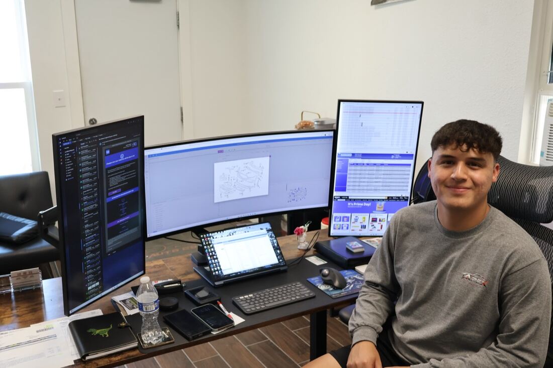 Apex estimator reviewing a repair at the front-office workstation